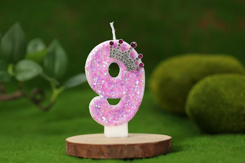 Sweet crown embellished paraffin wax birthday candles in digital shape