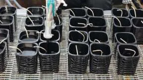 Showing the process of filling small-batch scented candles